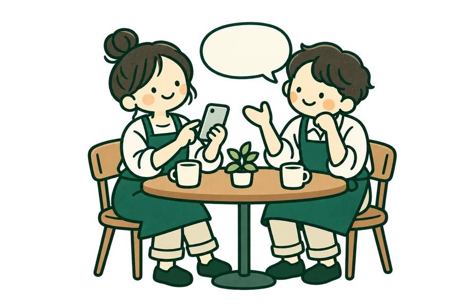 スマホを見ながら相談する二人の店主